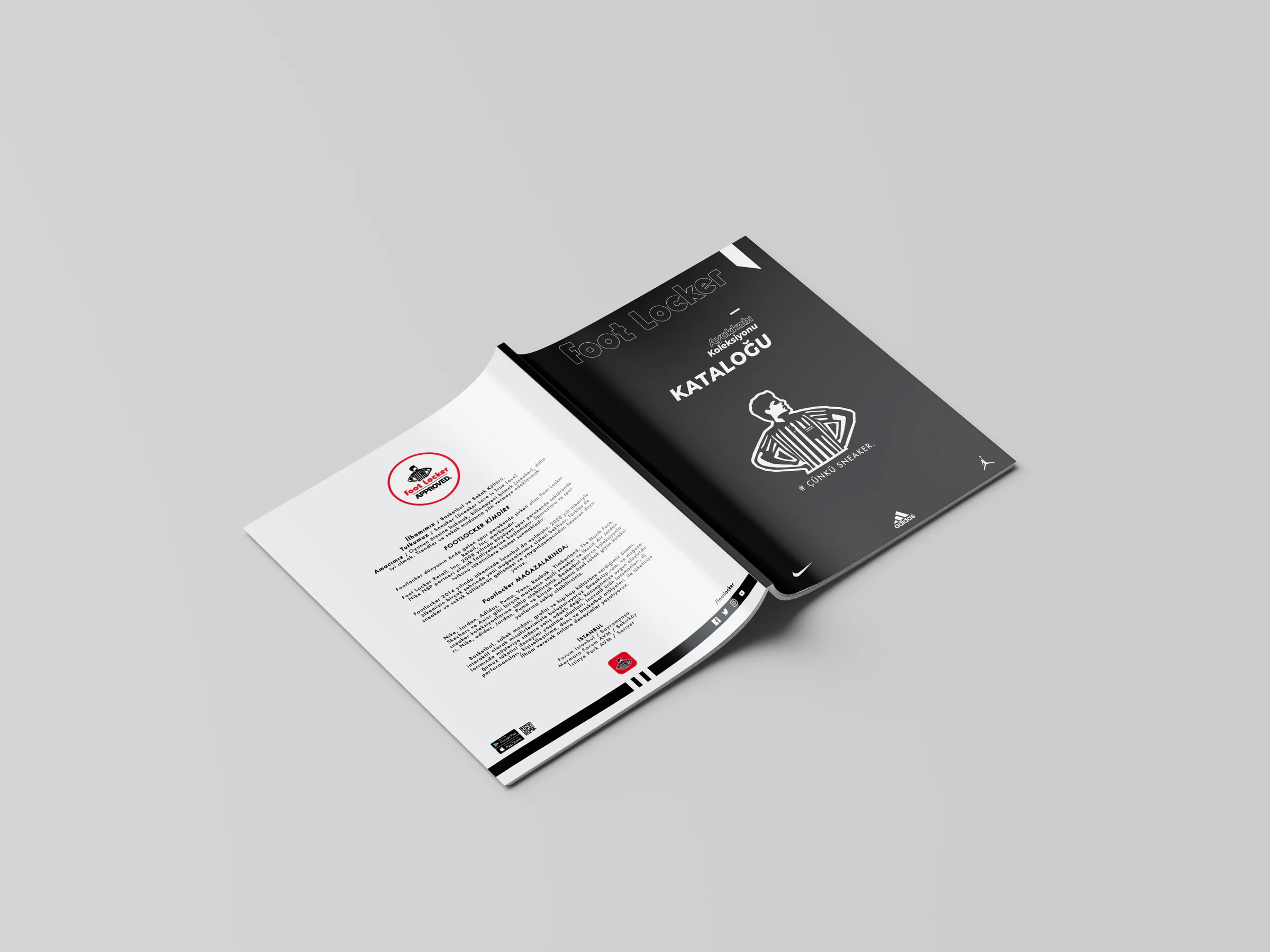 Catalogue opened flat: white back cover with a red Foot Locker Approved badge and centred text, beside the black front cover.
