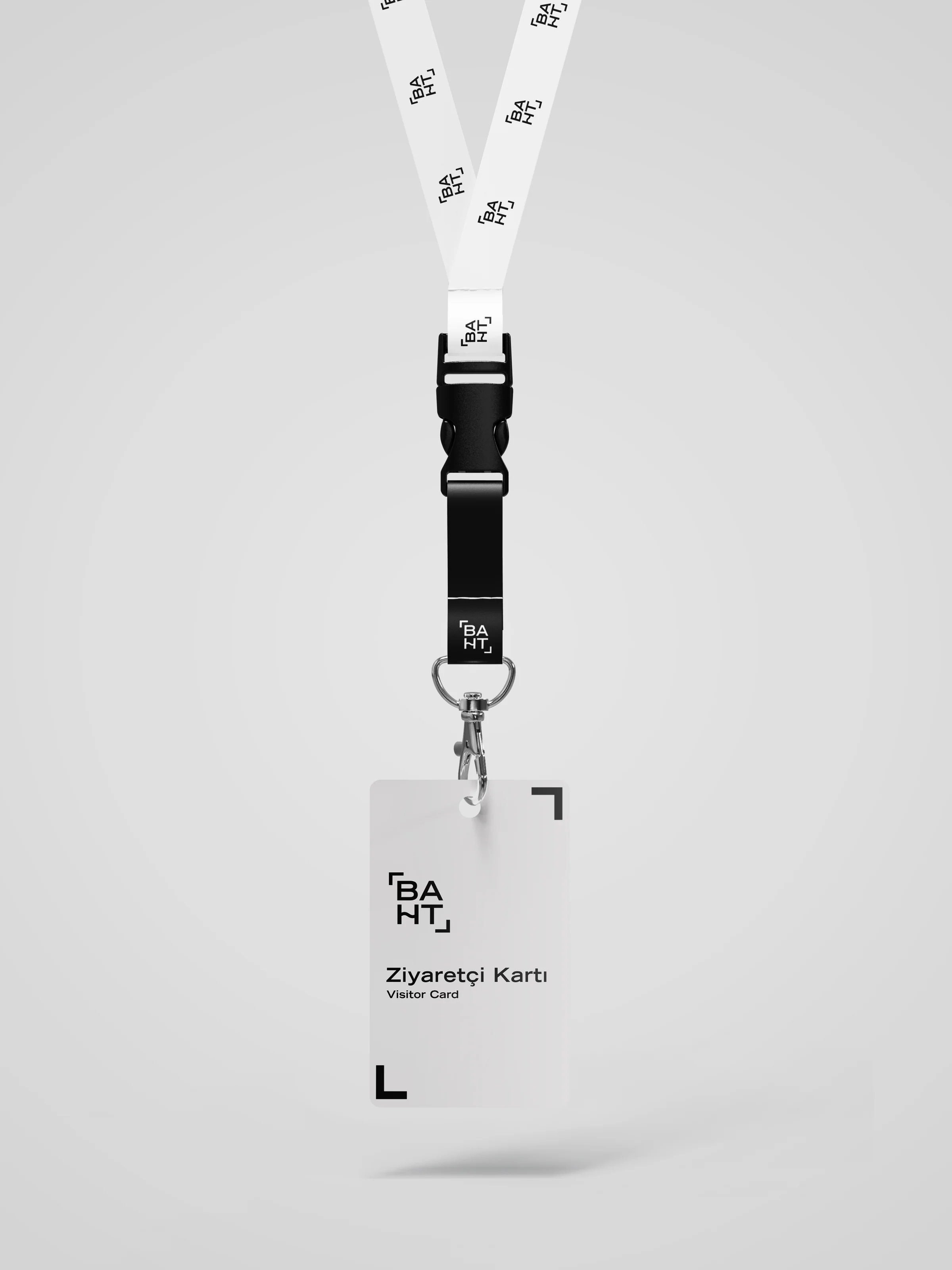 White and black lanyard repeating the baht logo, holding a card that reads Ziyaretçi Kartı, Visitor Card.