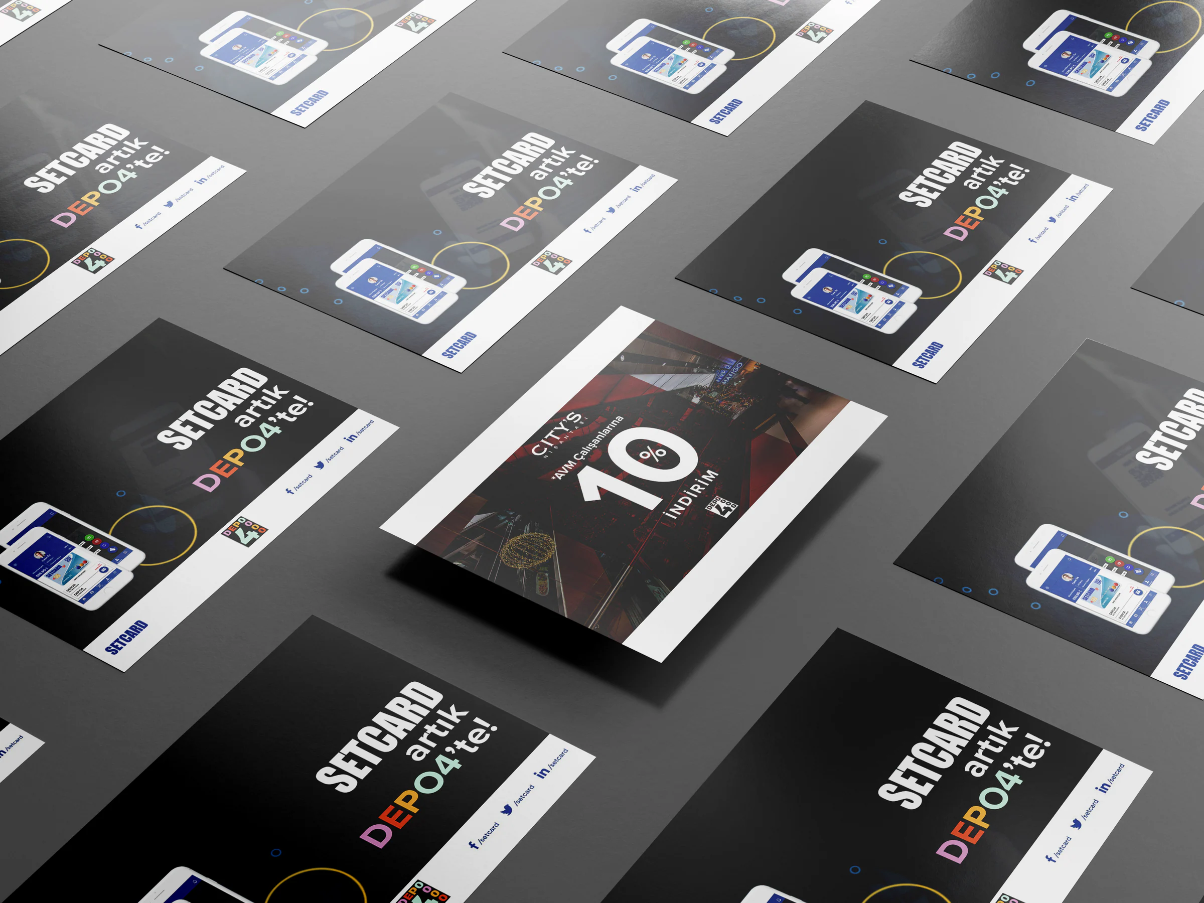 Rows of dark SETCARD artık DEPO4'te! posters with a phone app image, around one raised poster offering City's mall staff 10% off.